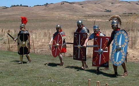 Close - up of Gaius Germanicus Magnus (Steve Oster), Patti Ballard, Scott Poole, and Anthony Garbisch with Centurio Marcus