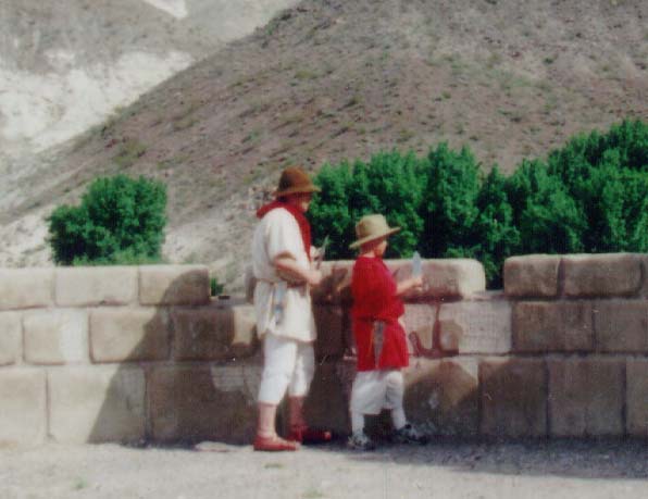 A couple of the troops lounge in the distinctive headgear of the Taauroviri Americanae, known in the local tongue as American Cowboys. Centurio Marcus looked the other way as long as the practice of adopting articles of barbarian dress did not get out of hand.