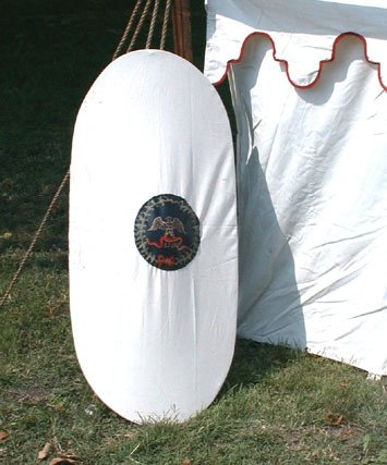 This scutum type shield and its cover were designed and hand crafted by our very own Centurio Marcus.  Animal motifs were quite popular with the Romans, especially the wolf.