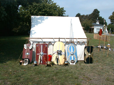 Another shot of weapons and armour owned by Legio X fretensis.  Two gladius type swords are shown here.  The Mainz pattern is on the left and the less ornate Pompeii pattern is to the right.